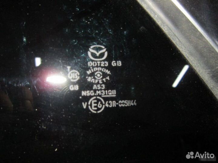 Форточка левая в крыло Mazda Cx7