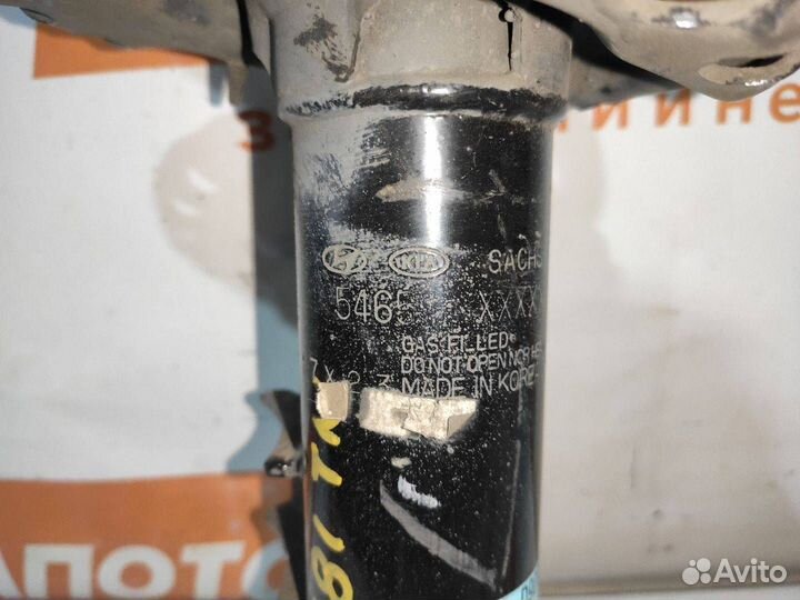 Стойка амортизатора передняя левая Kia Sportage 4