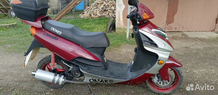 Скутер Omaks