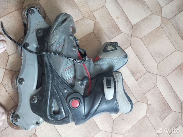 Роликовые коньки