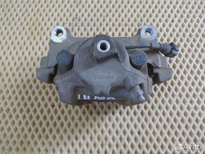 Суппорт передний левый VW Tiguan 2007-2011 (5N0615123 5N0615125)