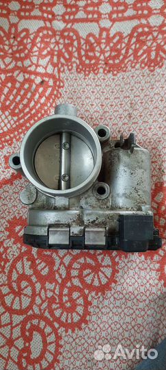Дроссельная заслонка
