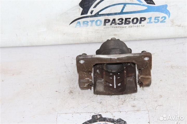 Суппорт тормозной передний левый Honda Fit GD1