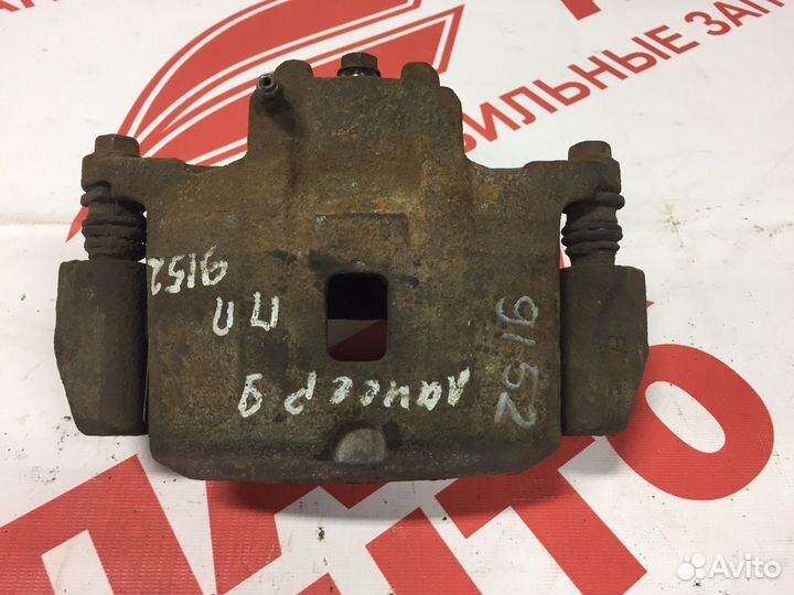 Суппорт диск передний Mitsubishi Lancer 9