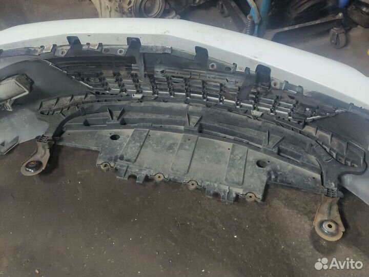 Передний бампер на Опель Астра J дорестайл