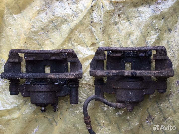 Суппорт тормозной передний Mazda 626 GE 91-97 гг