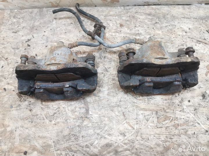 Суппорт тормозной передний Suzuki Liana 1.6 M16A