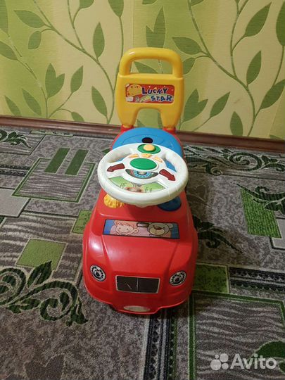 Развивающий автомобиль каталка