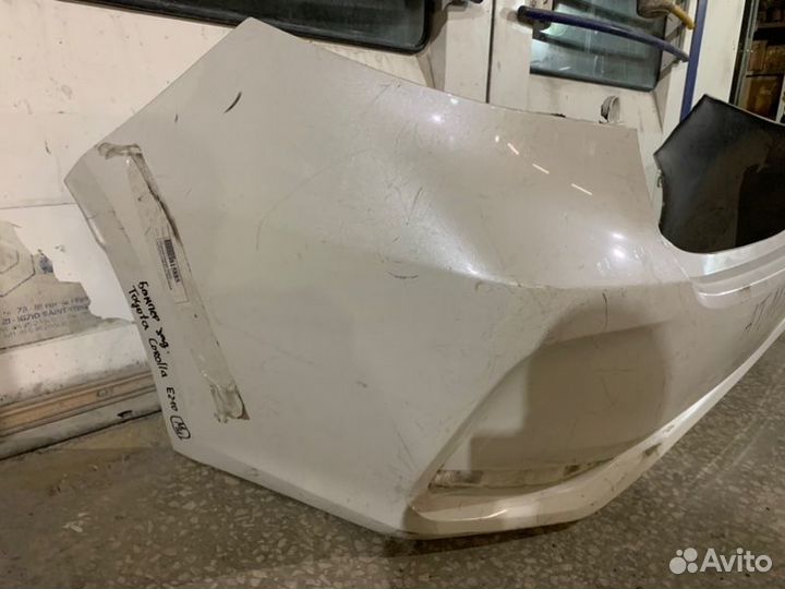 Бампер задний Toyota Corolla E210