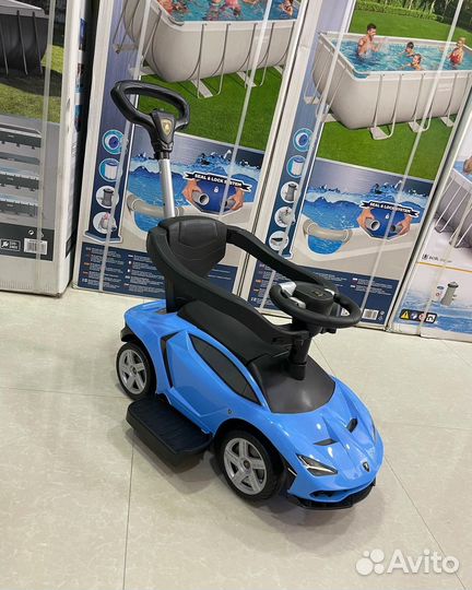 Машинка каталка толокар с ручкой