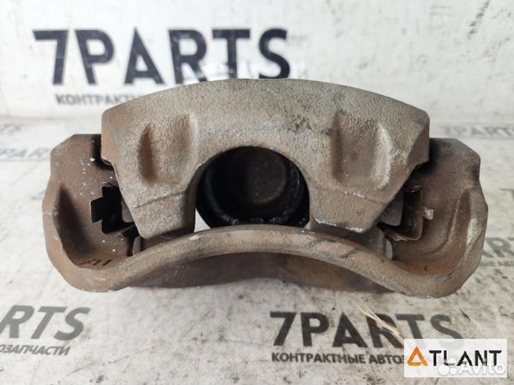 Суппорт передний левый toyota isis