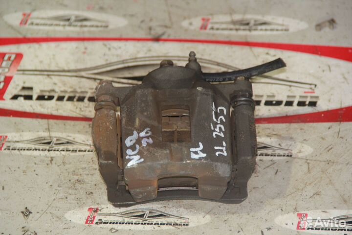 Суппорт перед лево c Toyota Raum NCZ20 1NZ-FE