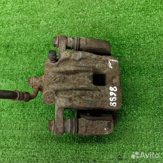 Суппорт тормозной задний правый SsangYong Actyon 2