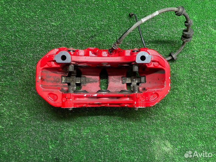 Суппорт передний левый Porsche Macan