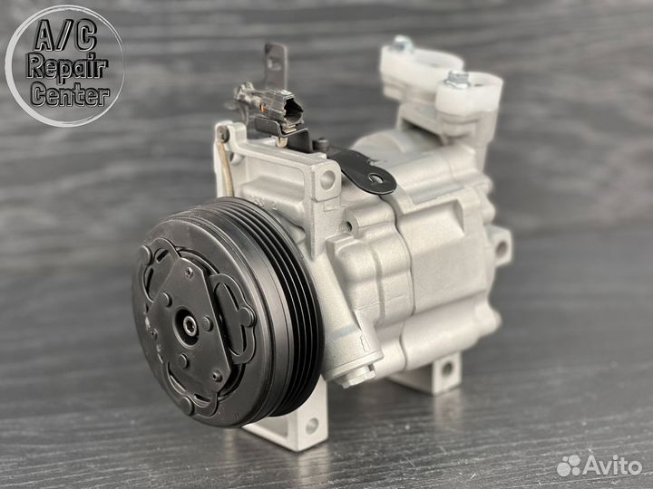 Компрессор кондиционера Subaru Impreza