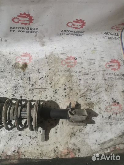 Стойка подвески передняя левая Лада 2110 2111 1999