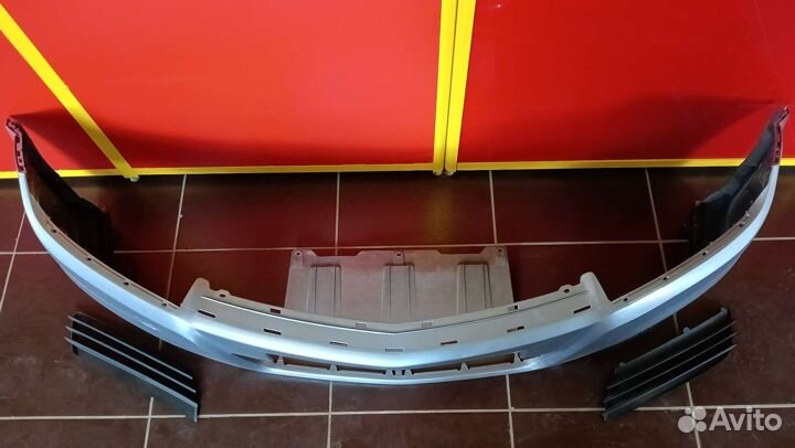 Передний бампер Opel Astra H