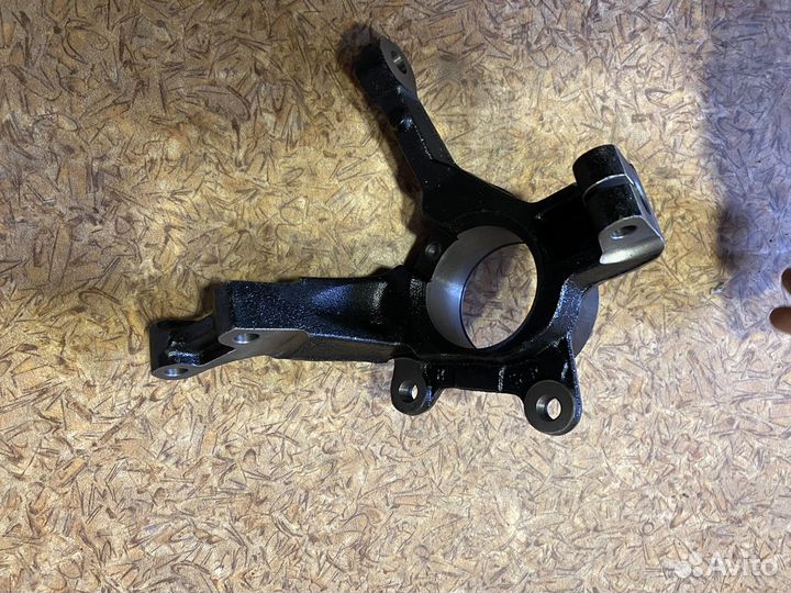 Кулак поворотный передний правый Рено логан 2