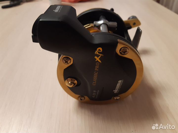 Катушка рыболовная мультипликаторная