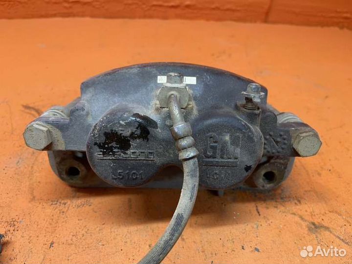 Суппорт тормозной передний левый Chevrolet Tahoe