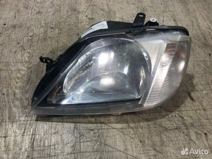 Фара левая Renault Logan 2009-2014