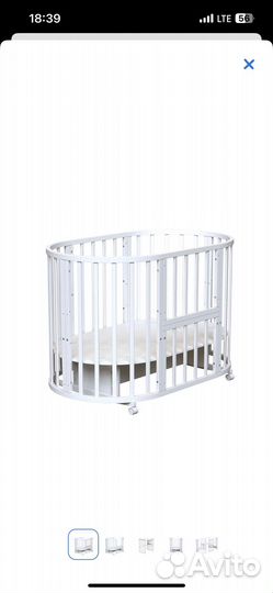 Детская кроватка с маятником