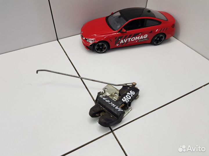 Замок багажника (Mitsubishi Lancer)