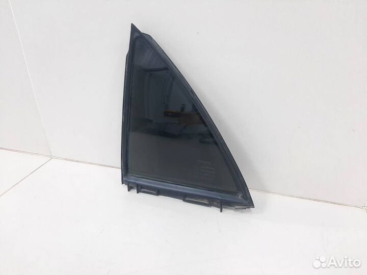 Стекло двери задней левой форточка Toyota Corolla