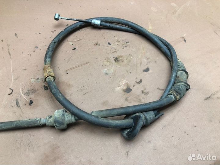 Трос ручника Mitsubishi Lancer седан 4G18 2005