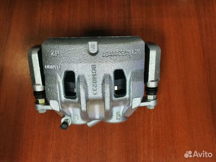 Передний левый суппорт на Газель Next