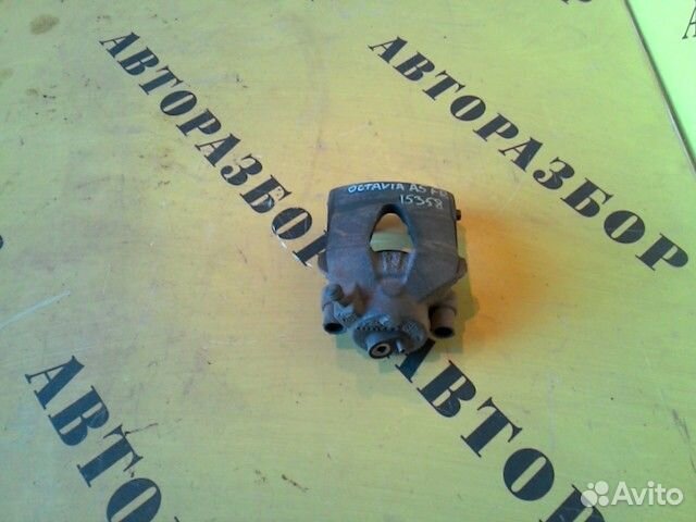 Суппорт передний правый Skoda Octavia (A5)