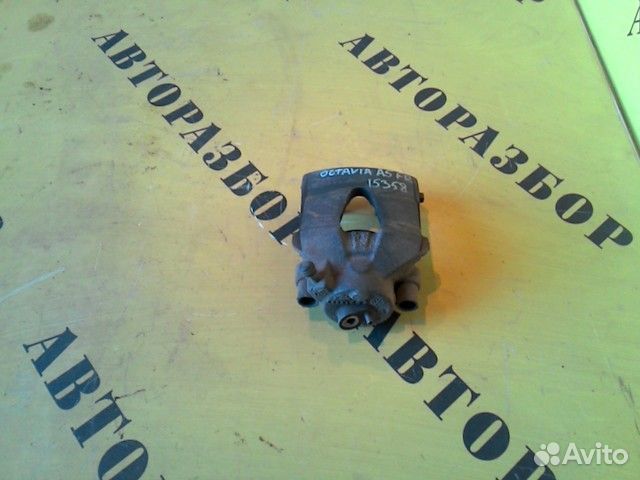 Суппорт передний правый Skoda Octavia (A5)