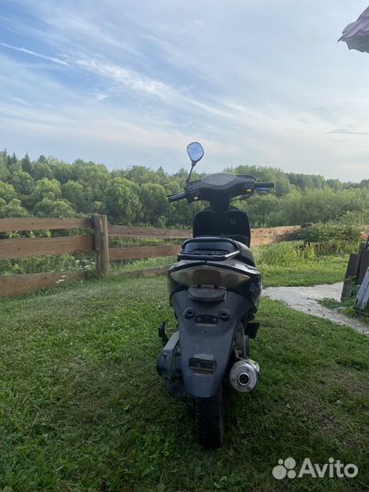 Мопед (скутер)