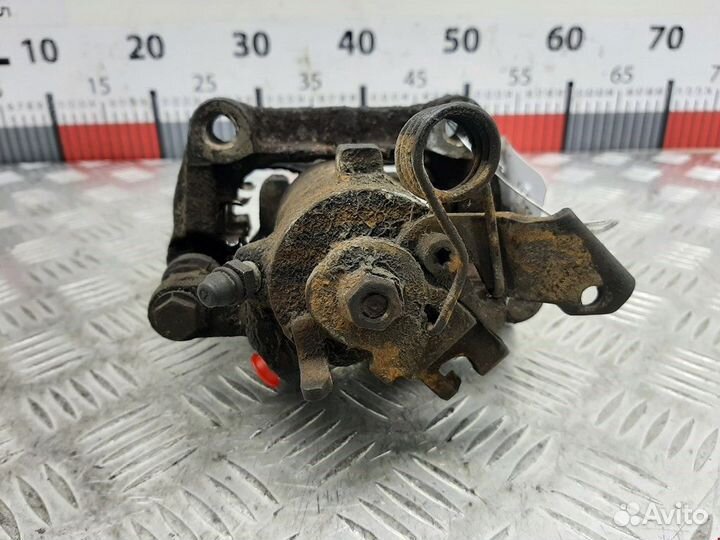 Суппорт задний левый Opel Zafira (A) рест. 2005