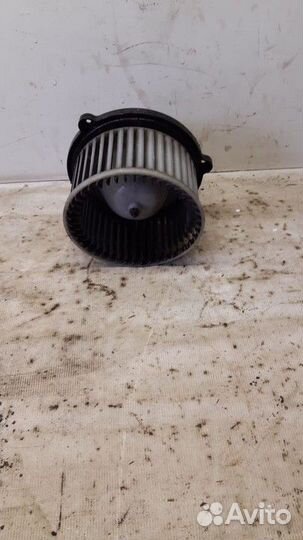 Моторчик отопителя Kia Shuma