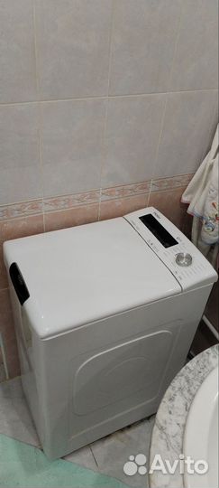 Стиральная машина с вертикальной загрузкой