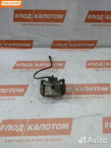 Суппорт тормозной передний правый Nissan Teana J32