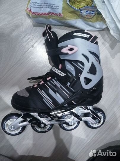 Роликовые коньки