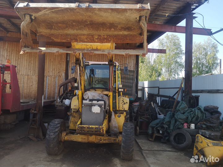 Экскаватор-погрузчик Komatsu WB93R-2, 2001