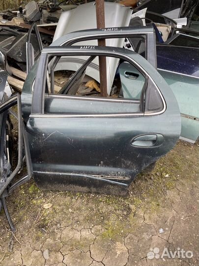 Киа Кларус 2 задняя дверь левая,правая