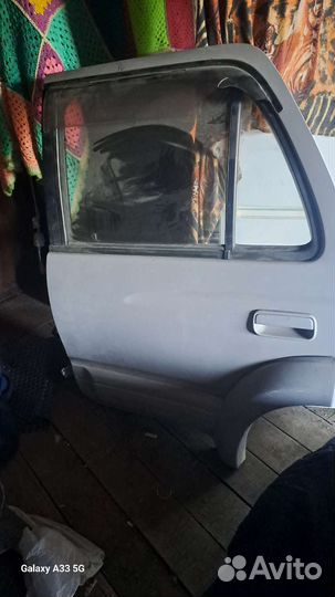 Задняя левая дверь на Сурф 185,в сборе