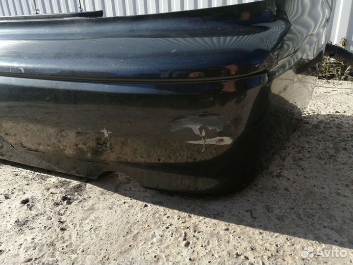 Бампер задний Mitsubishi Lancer Cedia CS 2000-2004