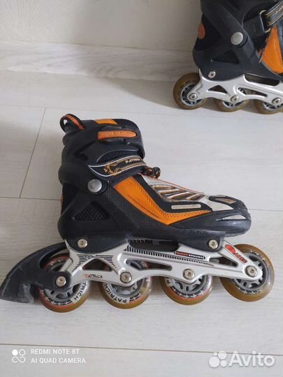 Роликовые коньки