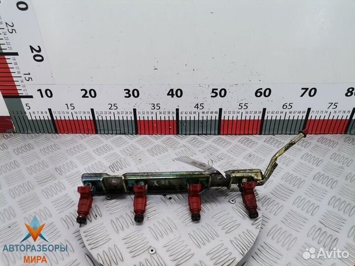 Форсунка Nissan Almera N16 рест. 2004 166009F600