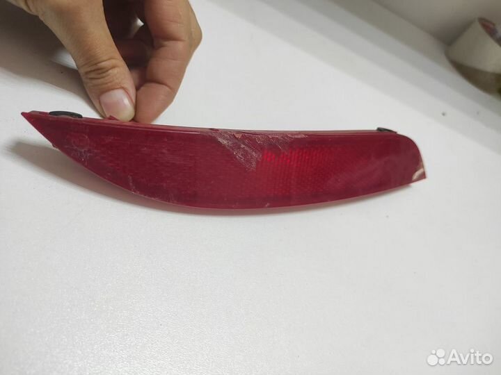 Отражатель задний Kia Rio 3