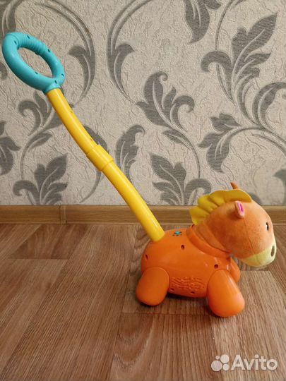 Каталка музыкальная игрушка лошадка fisher price