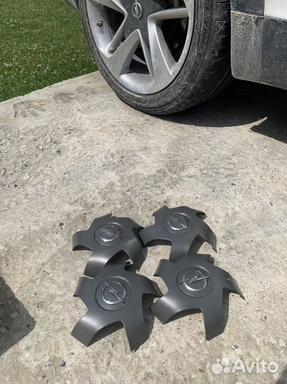 Колпачки на литые диски Opel Astra