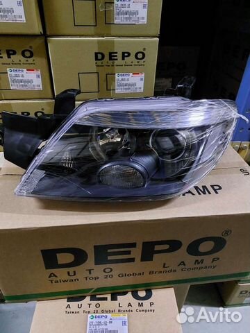 Outlander '03-06 Фара, левая, линз, черн, 8301A175