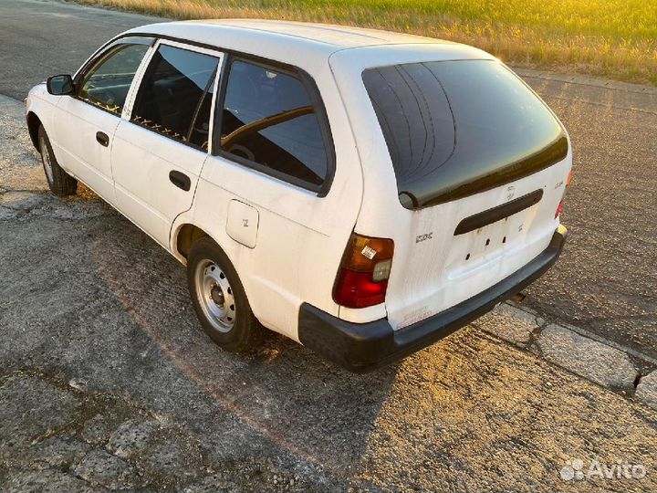 Зеркало салона на Toyota Corolla Wagon EE102V