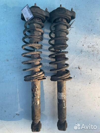 Стойка амортизатора задняя 30618110